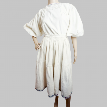 Old Romanian traditional clothing : Romanian blouse , folk skirt and wool folk apron