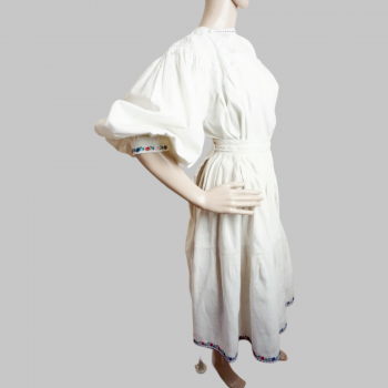 Old Romanian traditional clothing : Romanian blouse , folk skirt and wool folk apron