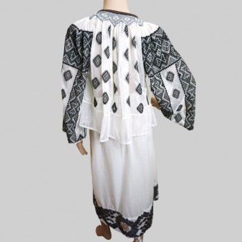 Traditional Romanian clothing : Romanian blouse , folk skirt and velvet apron