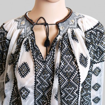 Traditional Romanian clothing : Romanian blouse , folk skirt and velvet apron